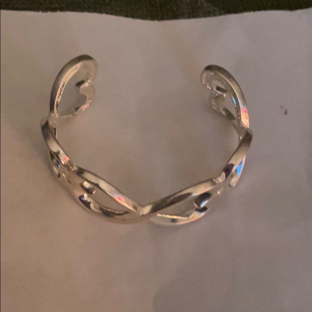 silver heart bangle.